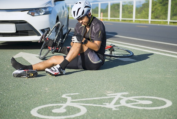 How Do Bicycle Helmet Laws Influence Injury Claims?